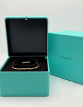 Tiffany & Co Diamond lock bangle yellow gold with diamond accents