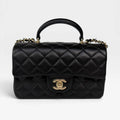 CHANEL MINI RECTANGLE TOP HANDLE IN BLACK LAMBSKIN LEATHER WITH PALE GOLD HARDWARE