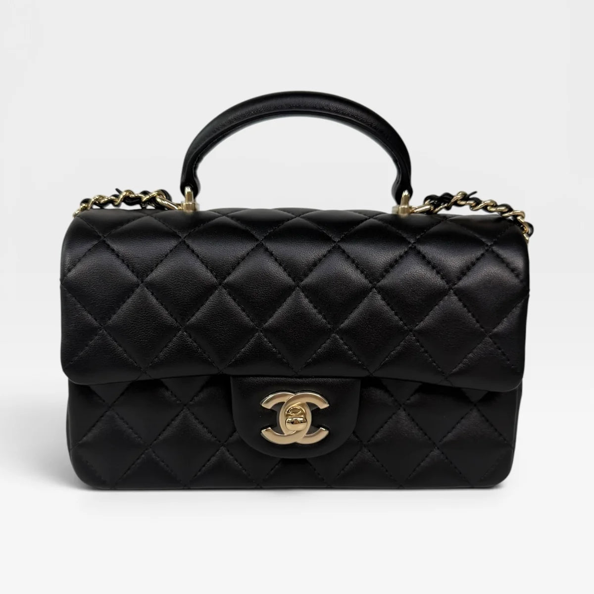 CHANEL MINI RECTANGLE TOP HANDLE IN BLACK LAMBSKIN LEATHER WITH PALE GOLD HARDWARE
