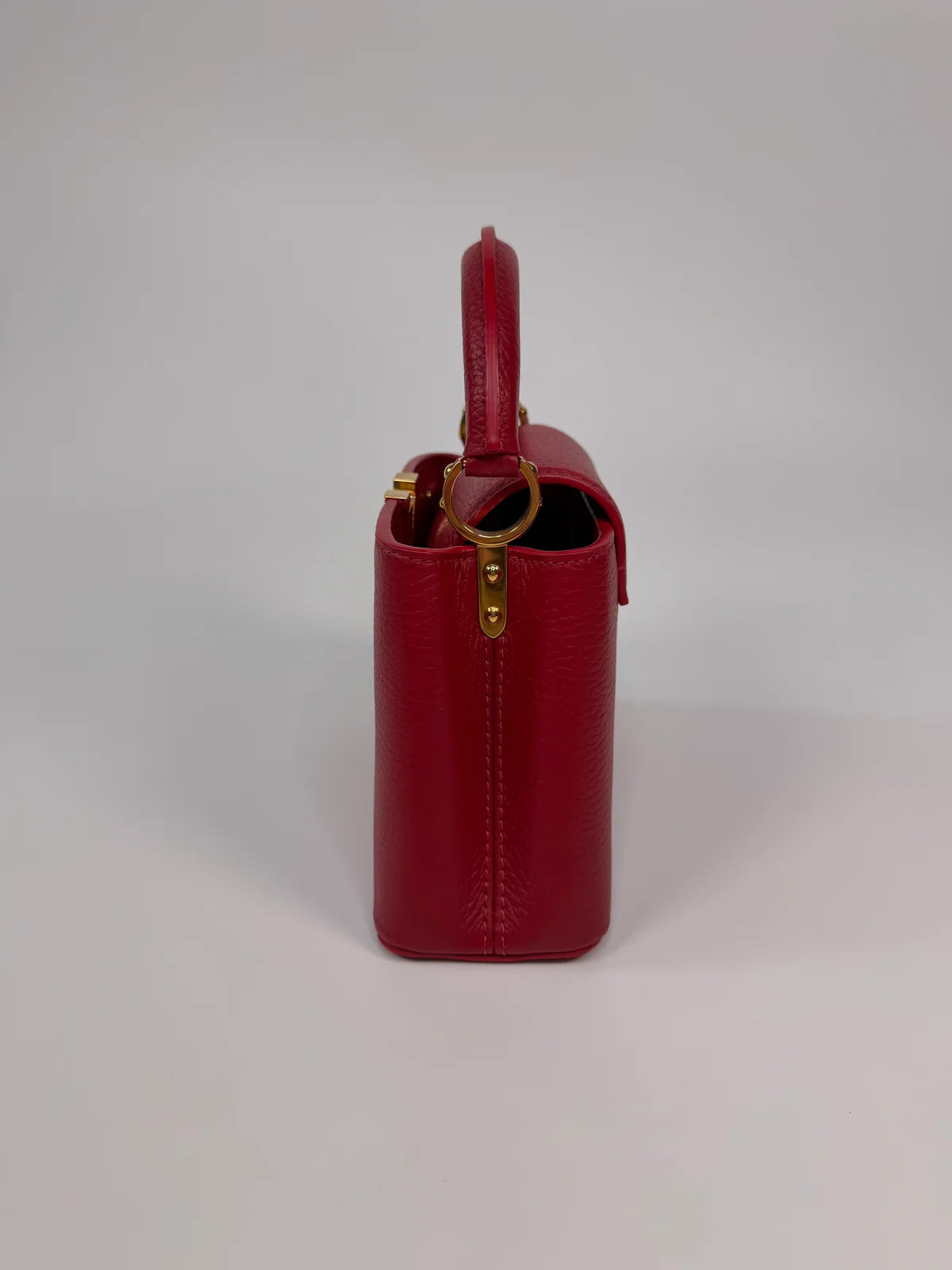LOUIS VUITTON CAPUCINES MINI BAG IN SCARLET TAURILLION LEATHER WITH GOLD HARDWARE
