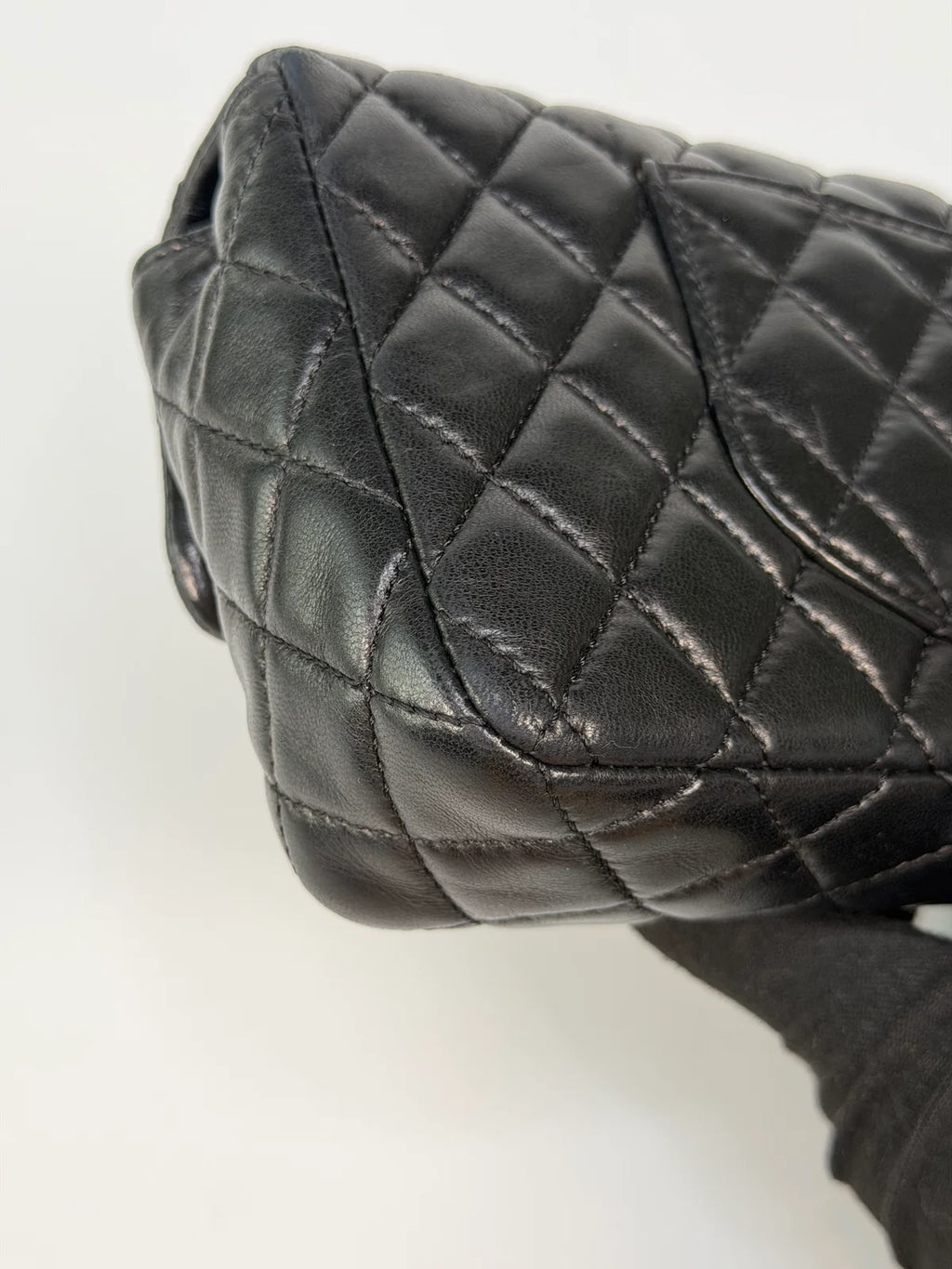 CHANEL EAST WEST CHARMS BAG IN BLACK LAMBSKIN LEATHER WITH GOLD HARDWARE