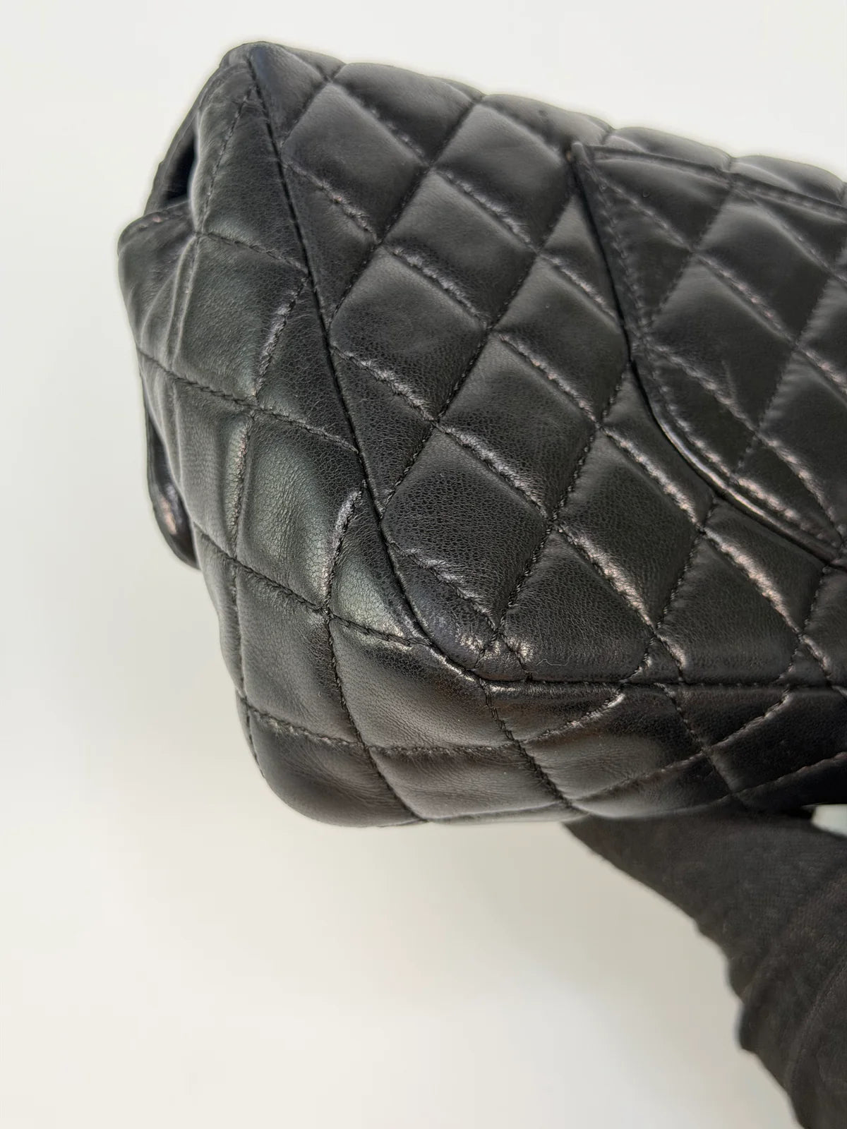 CHANEL EAST WEST CHARMS BAG IN BLACK LAMBSKIN LEATHER WITH GOLD HARDWARE