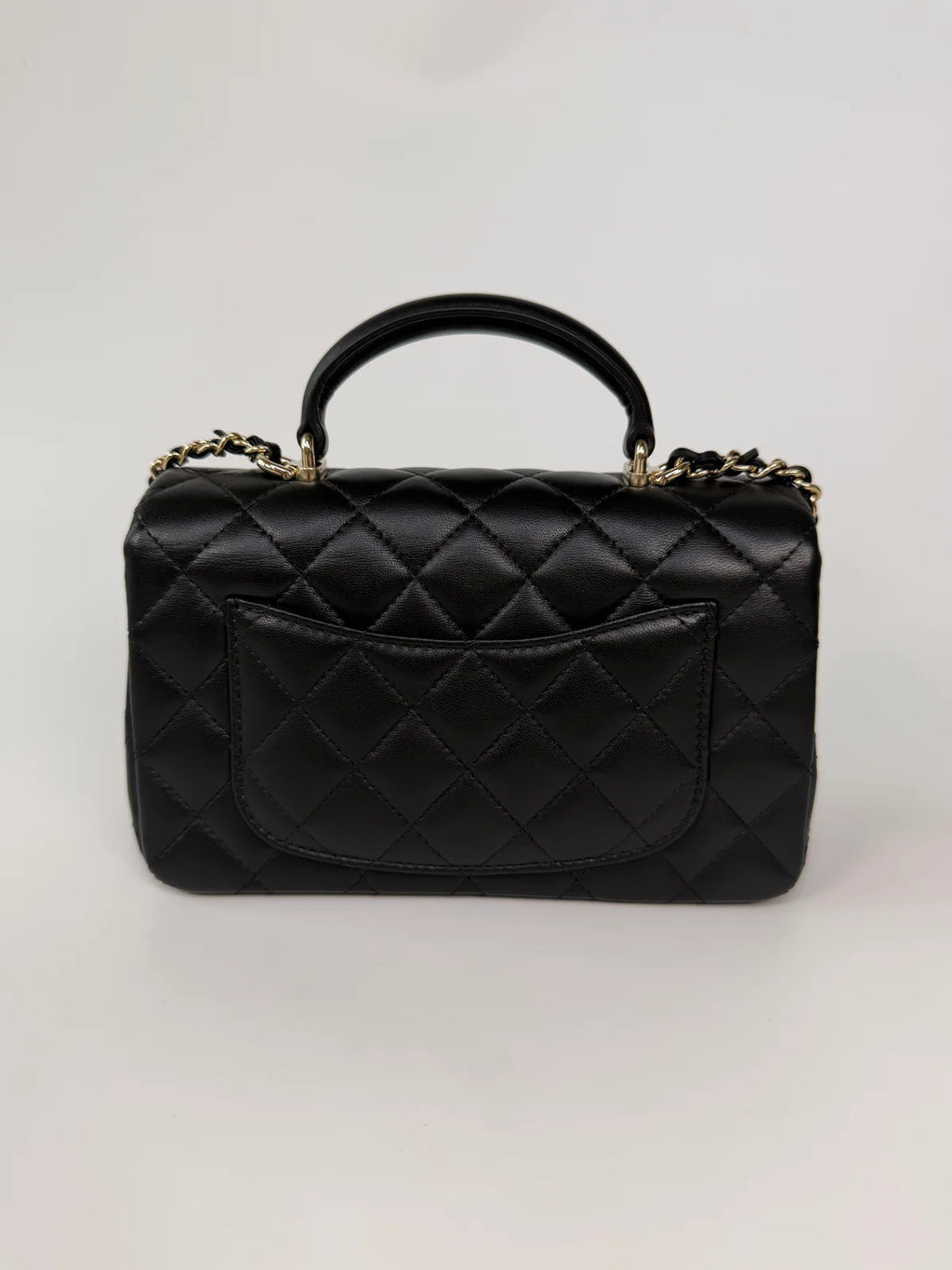 CHANEL MINI RECTANGLE TOP HANDLE IN BLACK LAMBSKIN LEATHER WITH PALE GOLD HARDWARE