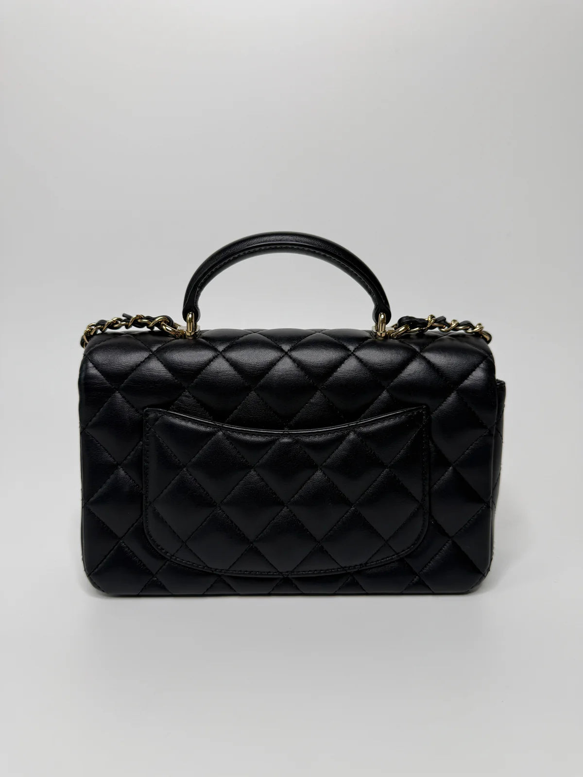 CHANEL MINI RECTANGLE TOP HANDLE FLAP BAG IN BLACK LAMBSKIN WITH PALE GOLD HARDWARE