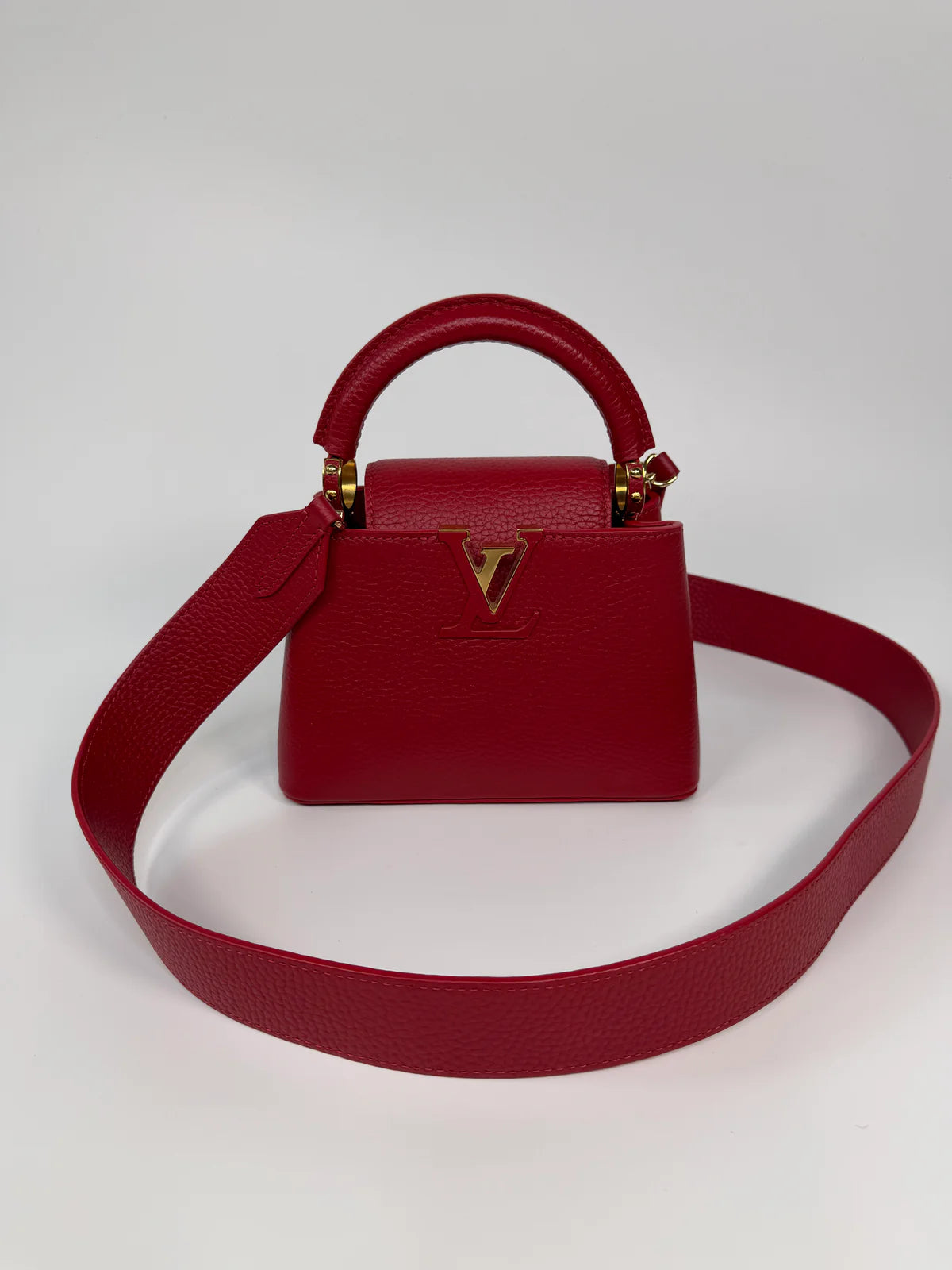 LOUIS VUITTON CAPUCINES MINI BAG IN SCARLET TAURILLION LEATHER WITH GOLD HARDWARE
