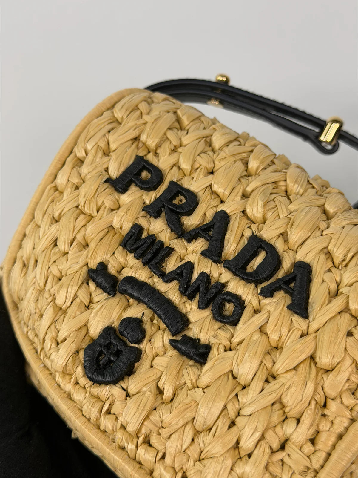 PRADA SMALL LOGO SHOULDER BAG IN NATURAL RAFFIA WITH GOLD HARDWARE