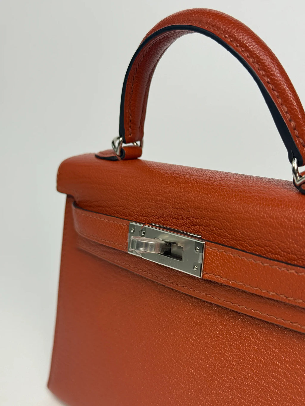HERMÈS MINI KELLY IN CUIVRE CHÈVRE MYSORE LEATHER WITH PALLADIUM HARDWARE