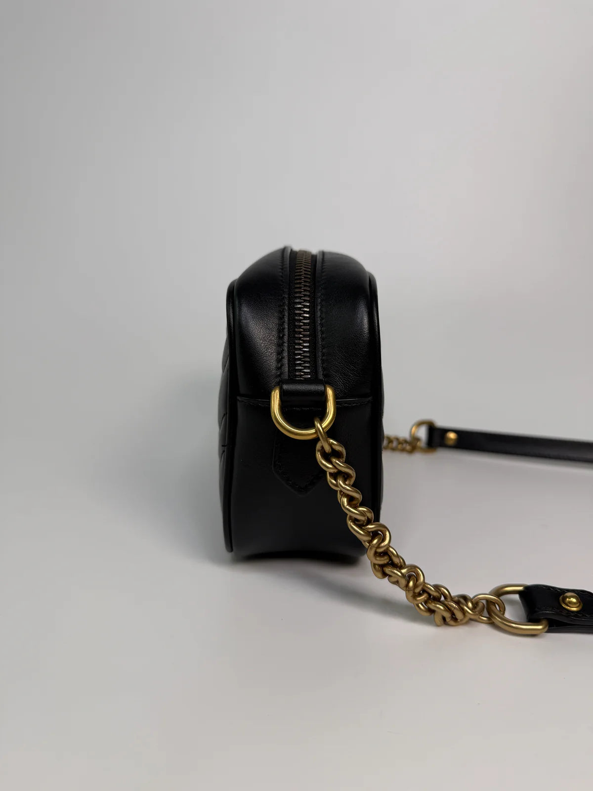 GUCCI SMALL MARMONT CAMERA BAG IN BLACK LEATHER WITH GOLD HARDWARE