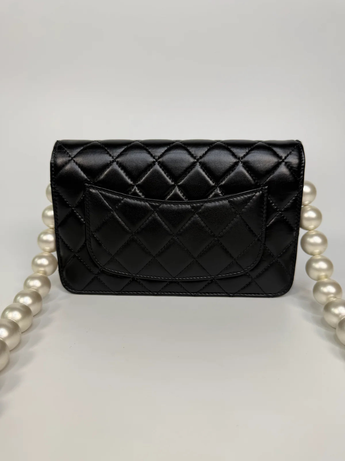 CHANEL PEARL WALLET ON CHAIN IN BLACK LAMBSKIN LEATHER WITH PALE GOLD HARDWARE