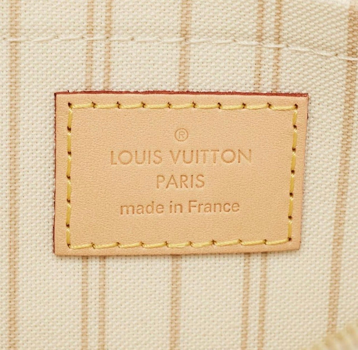 Louis Vuitton Neverfull White Coated Canvas Wristlet