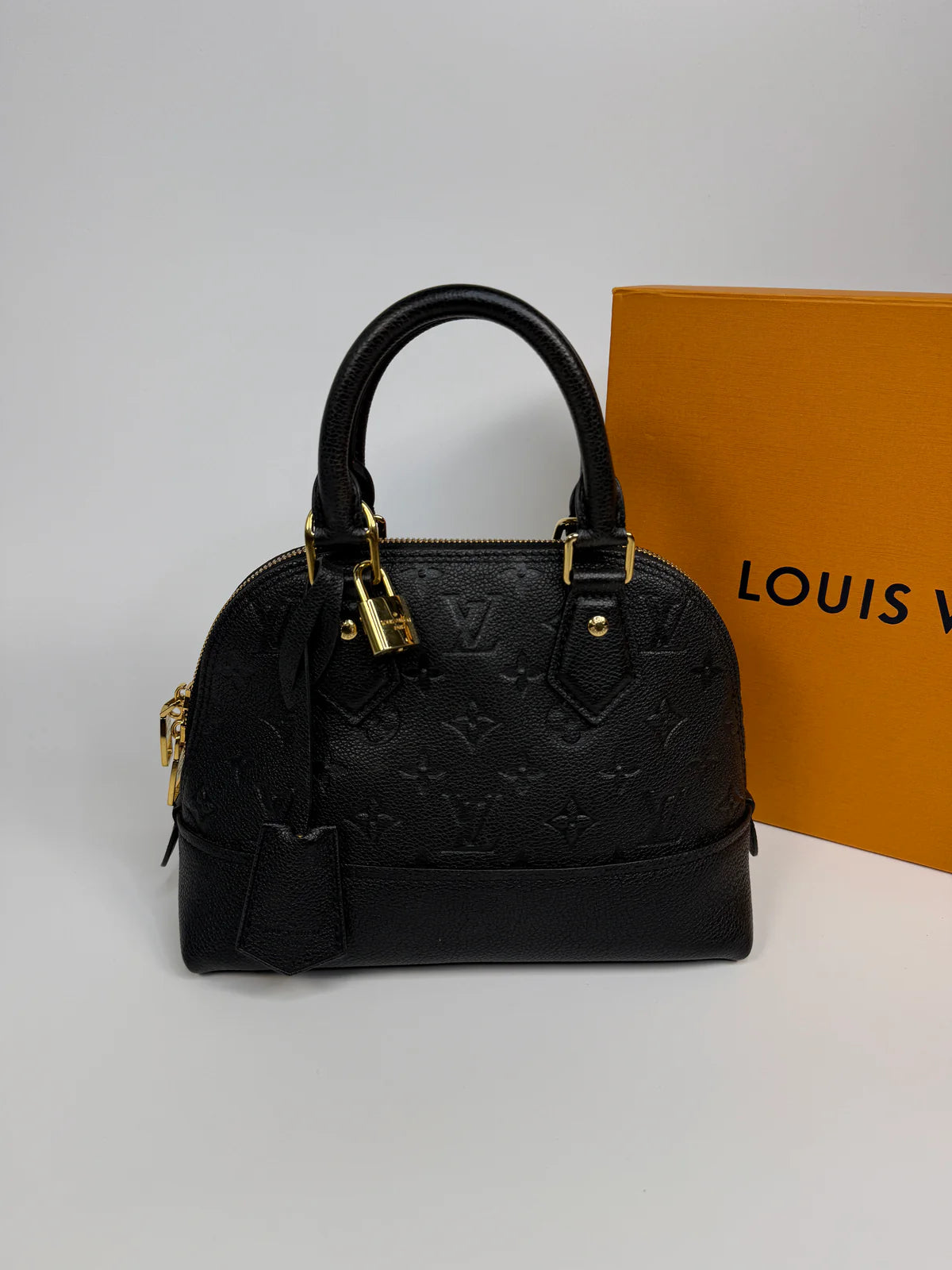 LOUIS VUITTON ALMA BB IN EMPREINTE BLACK MONOGRAM WITH GOLD HARDWARE