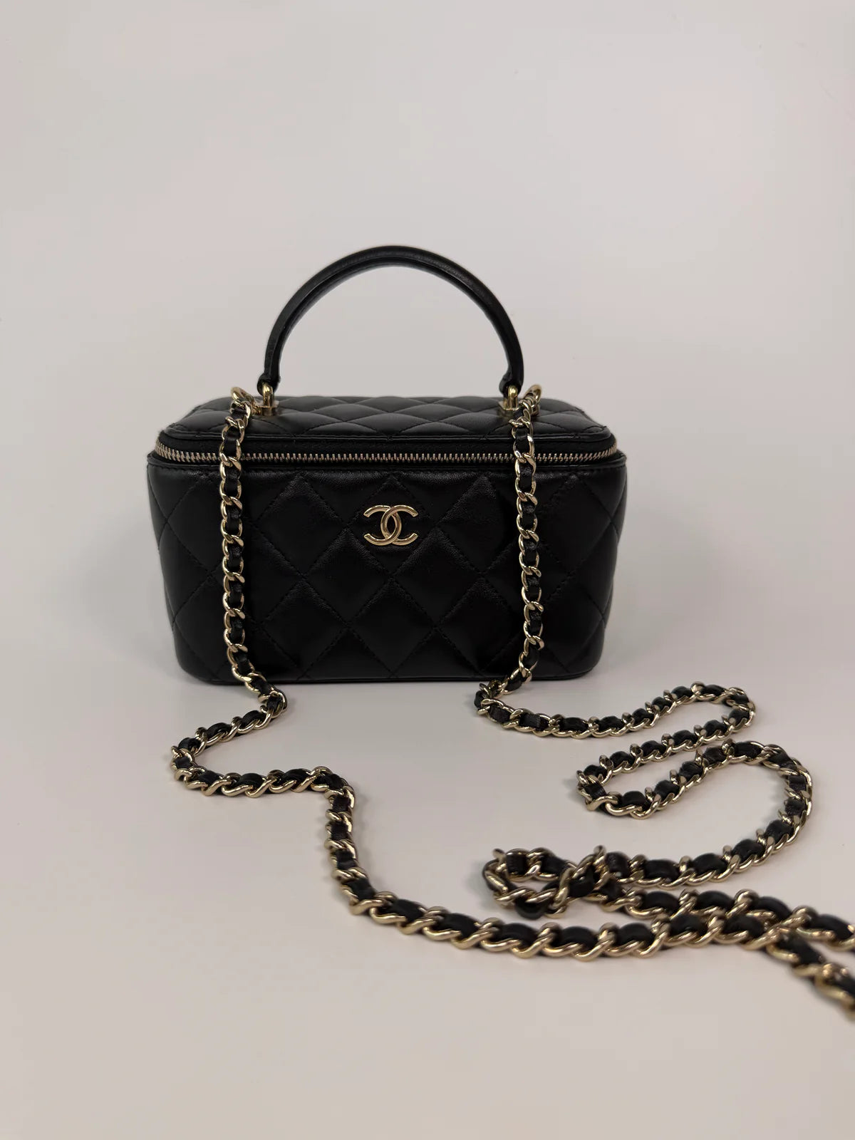 CHANEL VANITY TOP HANDLE IN BLACK LAMBSKIN WITH PALE GOLD HARDWARE