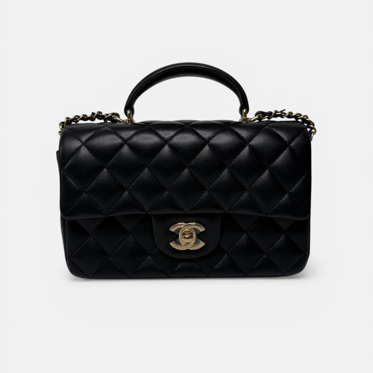 CHANEL MINI RECTANGLE TOP HANDLE FLAP BAG IN BLACK LAMBSKIN WITH PALE GOLD HARDWARE