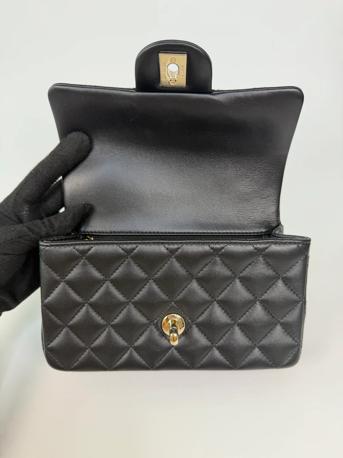 CHANEL MINI RECTANGLE TOP HANDLE IN BLACK LAMBSKIN LEATHER WITH PALE GOLD HARDWARE