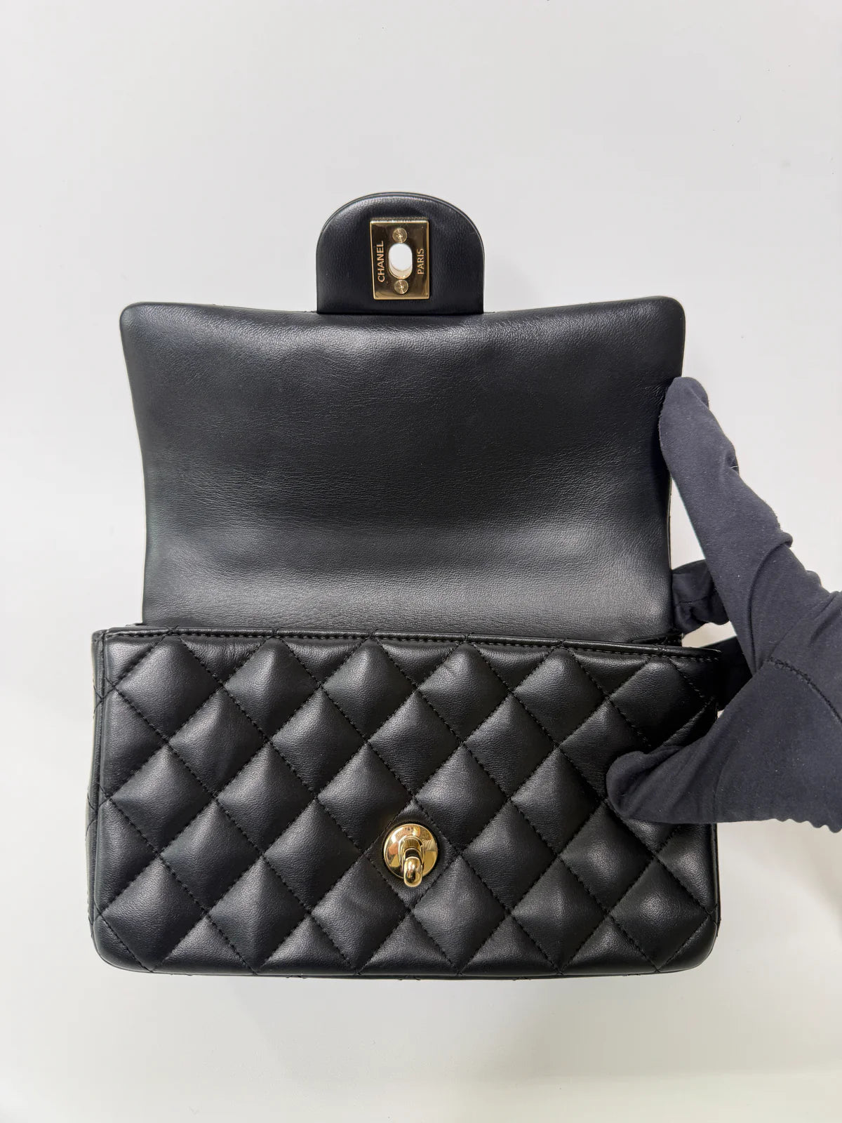 CHANEL MINI RECTANGLE TOP HANDLE FLAP BAG IN BLACK LAMBSKIN WITH PALE GOLD HARDWARE