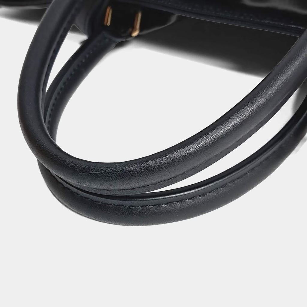 Louis Vuitton Black Leather Empreinte on the Go MM