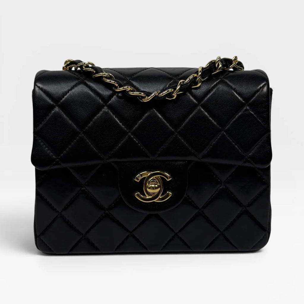 CHANEL BLACK SQUARE VINTAGE FLAP BAG IN LAMBSKIN WITH GOLD HARDWARE