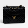 CHANEL BLACK SQUARE VINTAGE FLAP BAG IN LAMBSKIN WITH GOLD HARDWARE