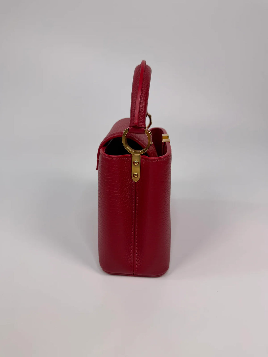 LOUIS VUITTON CAPUCINES MINI BAG IN SCARLET TAURILLION LEATHER WITH GOLD HARDWARE
