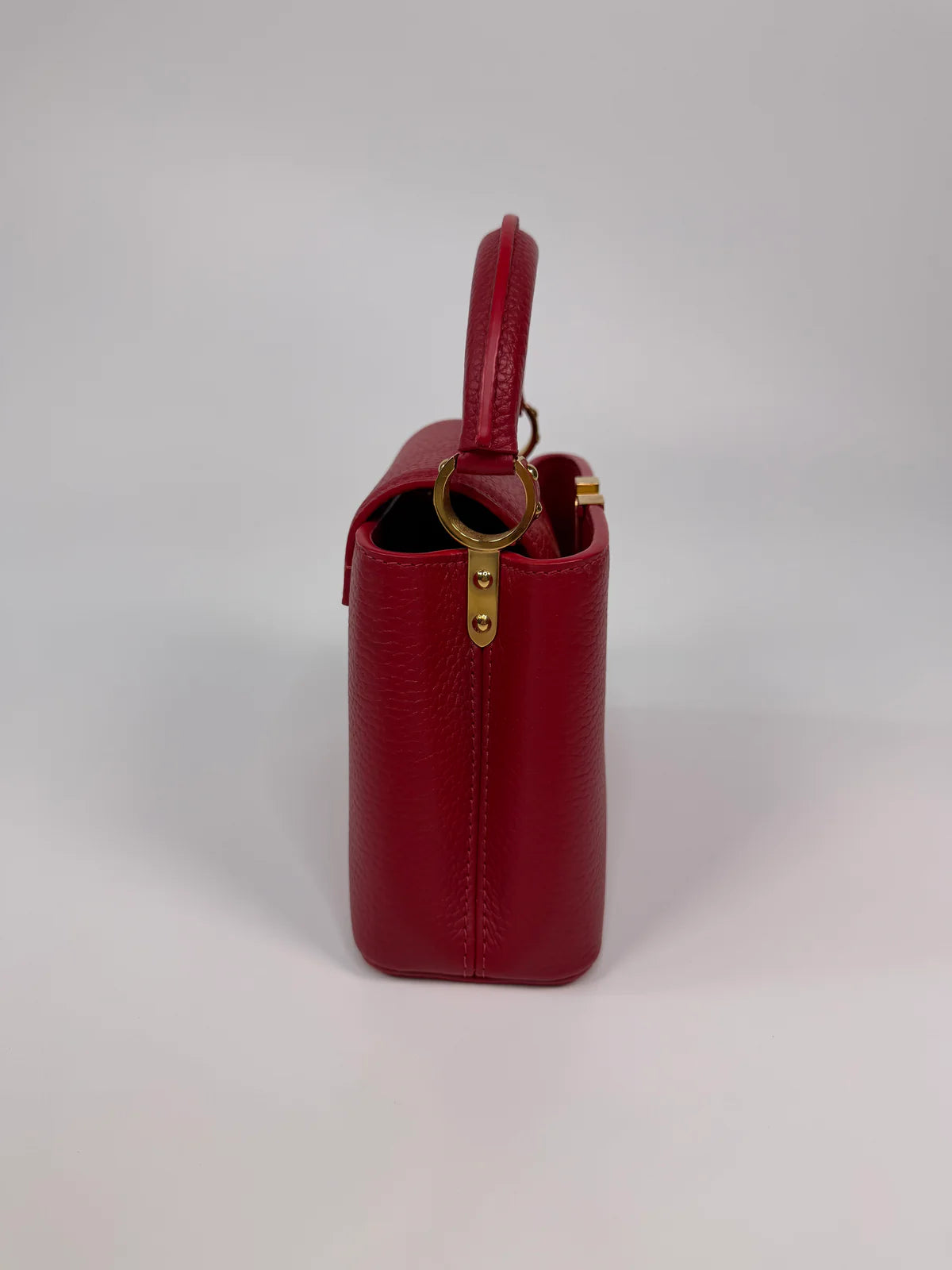 LOUIS VUITTON CAPUCINES MINI BAG IN SCARLET TAURILLION LEATHER WITH GOLD HARDWARE