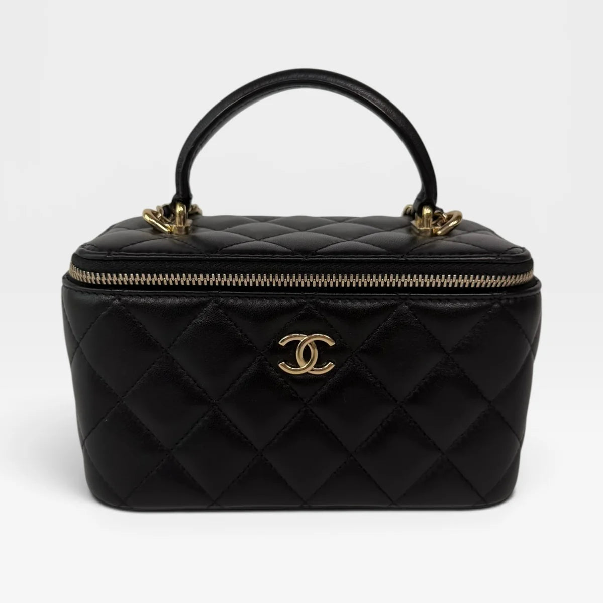 CHANEL VANITY TOP HANDLE IN BLACK LAMBSKIN WITH PALE GOLD HARDWARE
