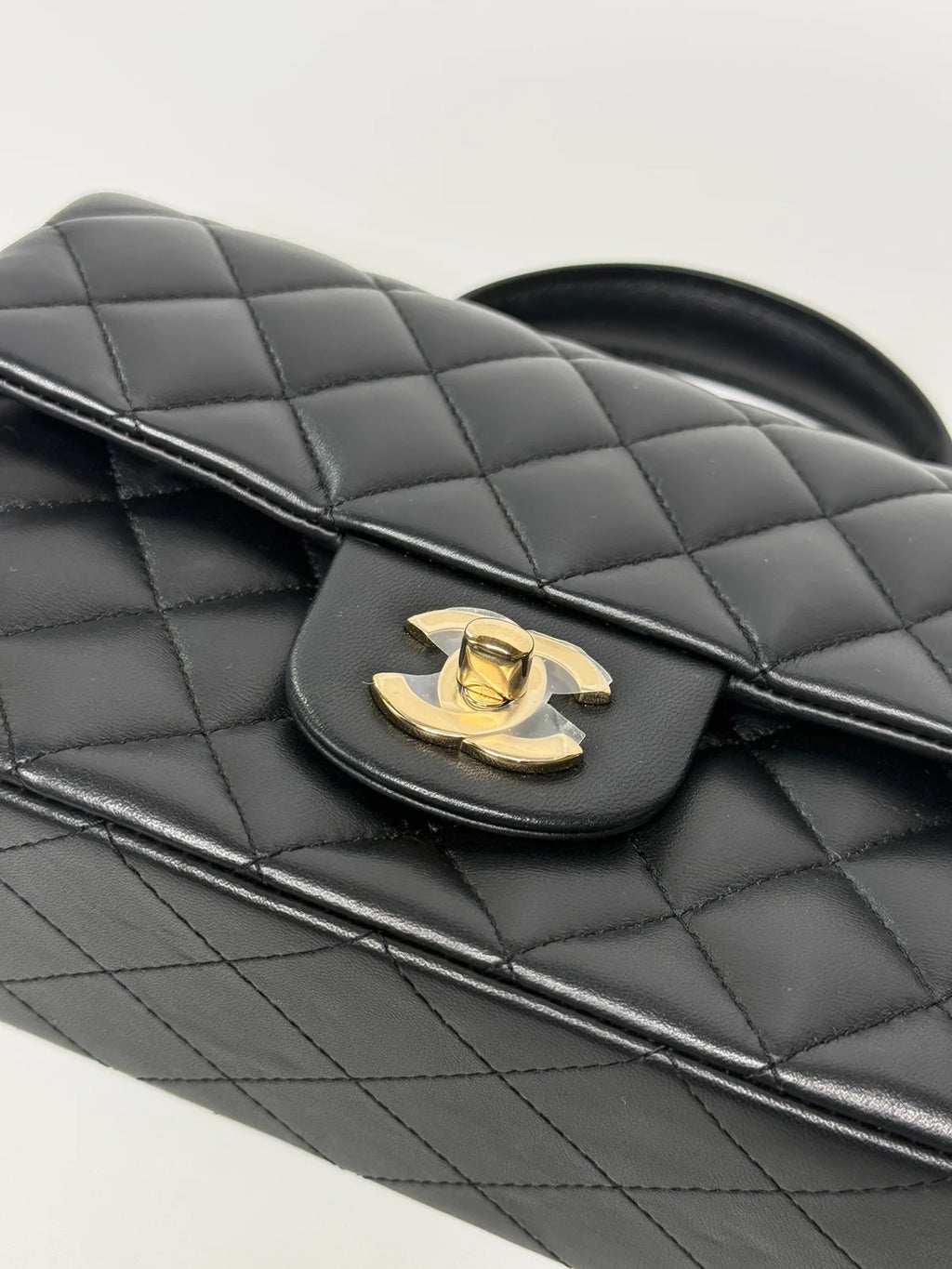 CHANEL MINI RECTANGLE TOP HANDLE FLAP BAG IN BLACK LAMBSKIN WITH PALE GOLD HARDWARE