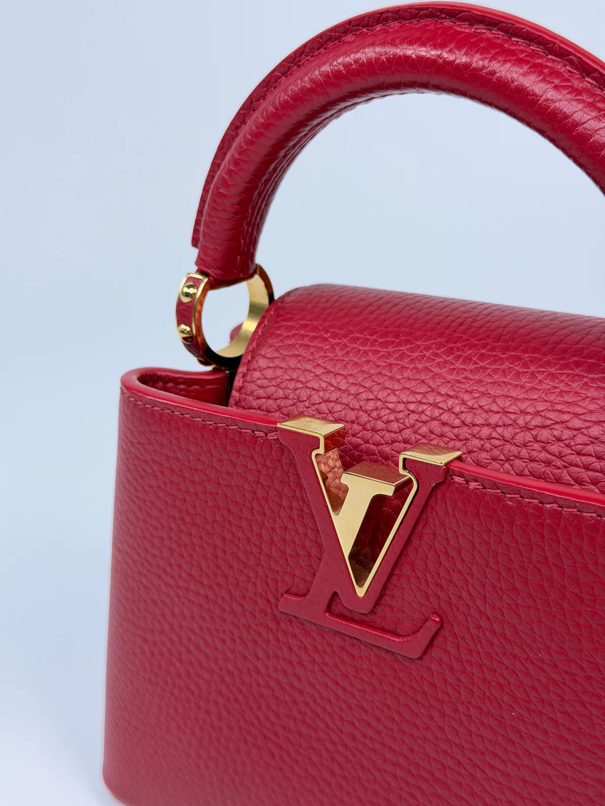 LOUIS VUITTON CAPUCINES MINI BAG IN SCARLET TAURILLION LEATHER WITH GOLD HARDWARE