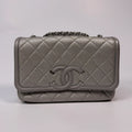 CHANEL CC FILIGREE WALLET ON CHAIN IN METALLIC SILVER