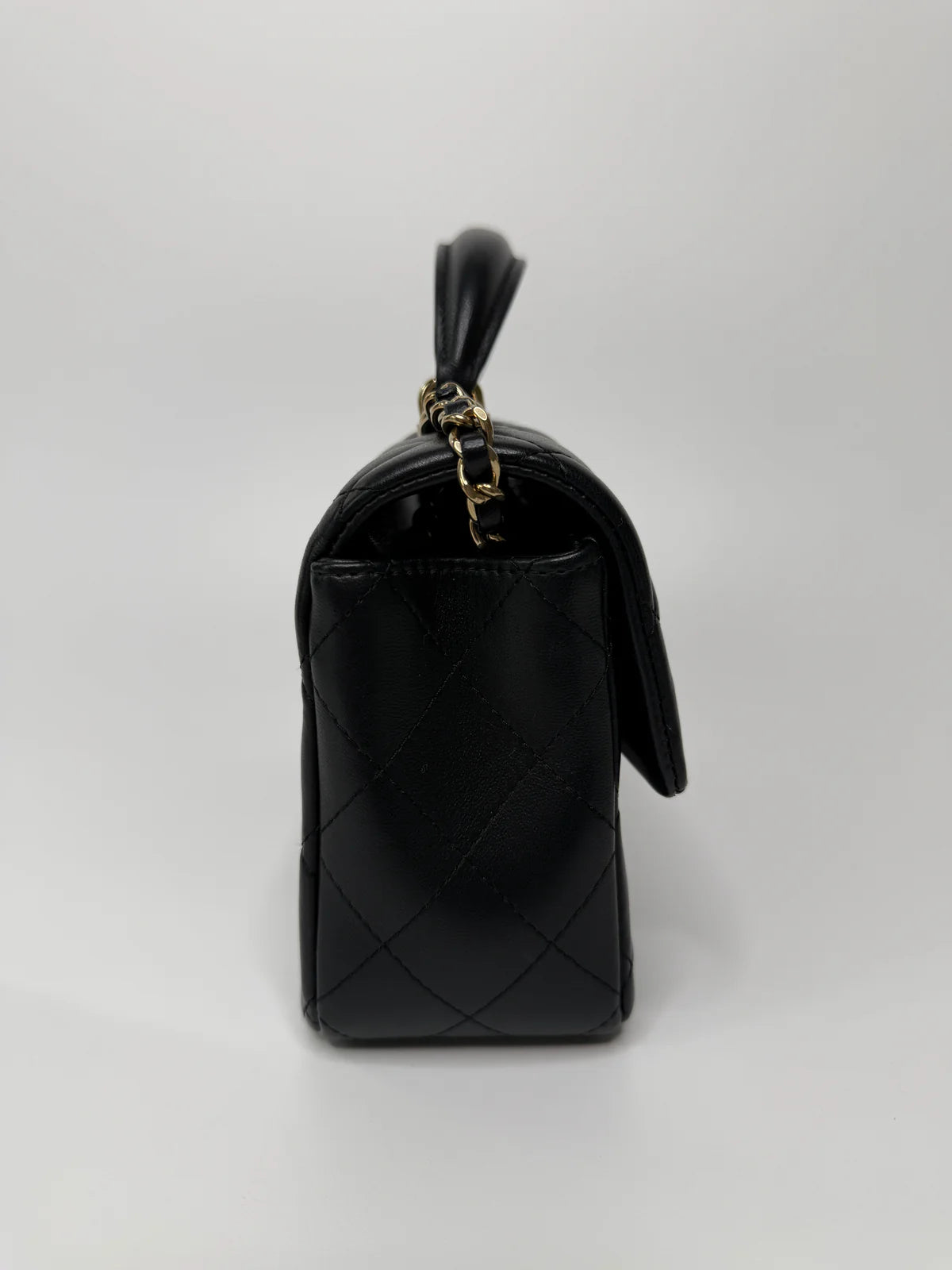 CHANEL MINI RECTANGLE TOP HANDLE FLAP BAG IN BLACK LAMBSKIN WITH PALE GOLD HARDWARE