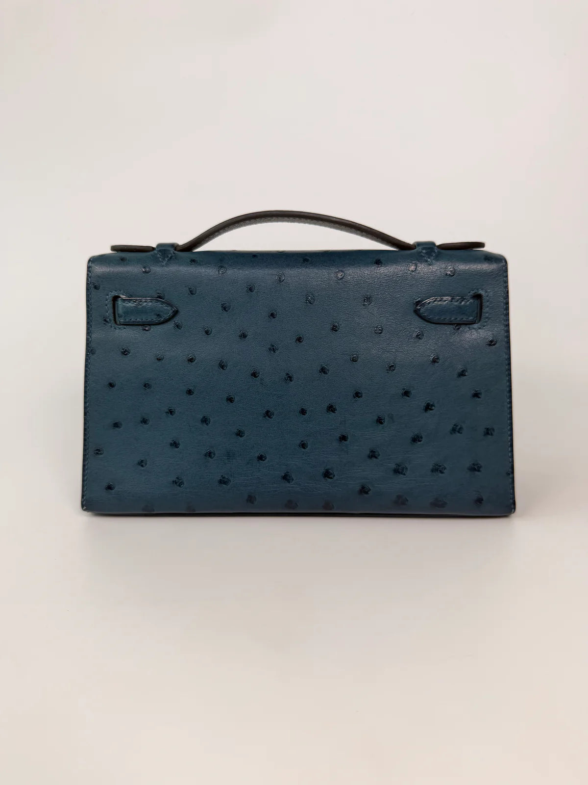 HERMÉS KELLY POCHETTE IN COLVERT OSTRICH WITH GOLD HARDWARE