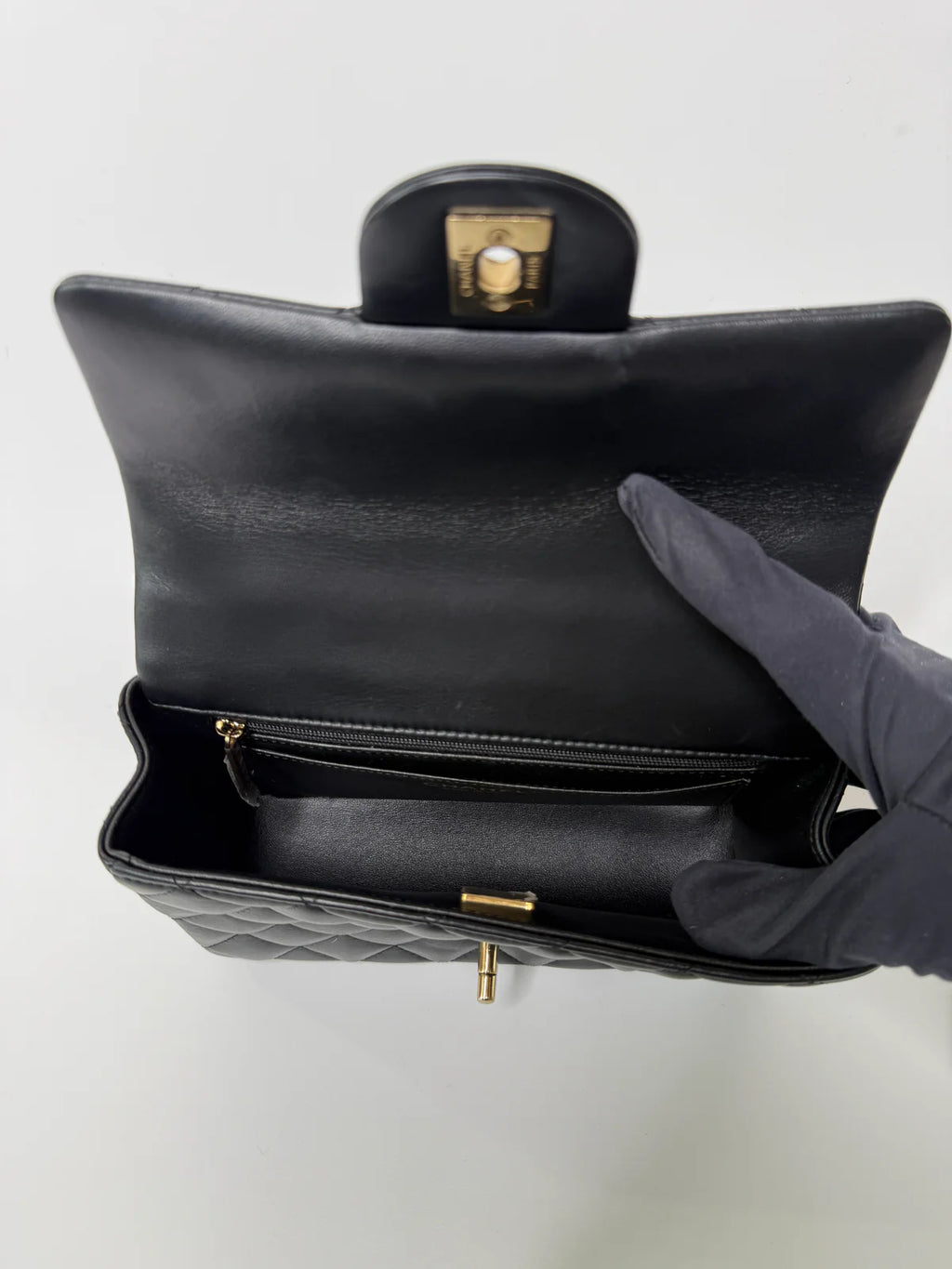 CHANEL MINI RECTANGLE TOP HANDLE FLAP BAG IN BLACK LAMBSKIN WITH PALE GOLD HARDWARE