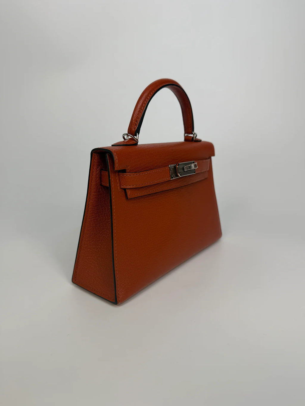 HERMÈS MINI KELLY IN CUIVRE CHÈVRE MYSORE LEATHER WITH PALLADIUM HARDWARE