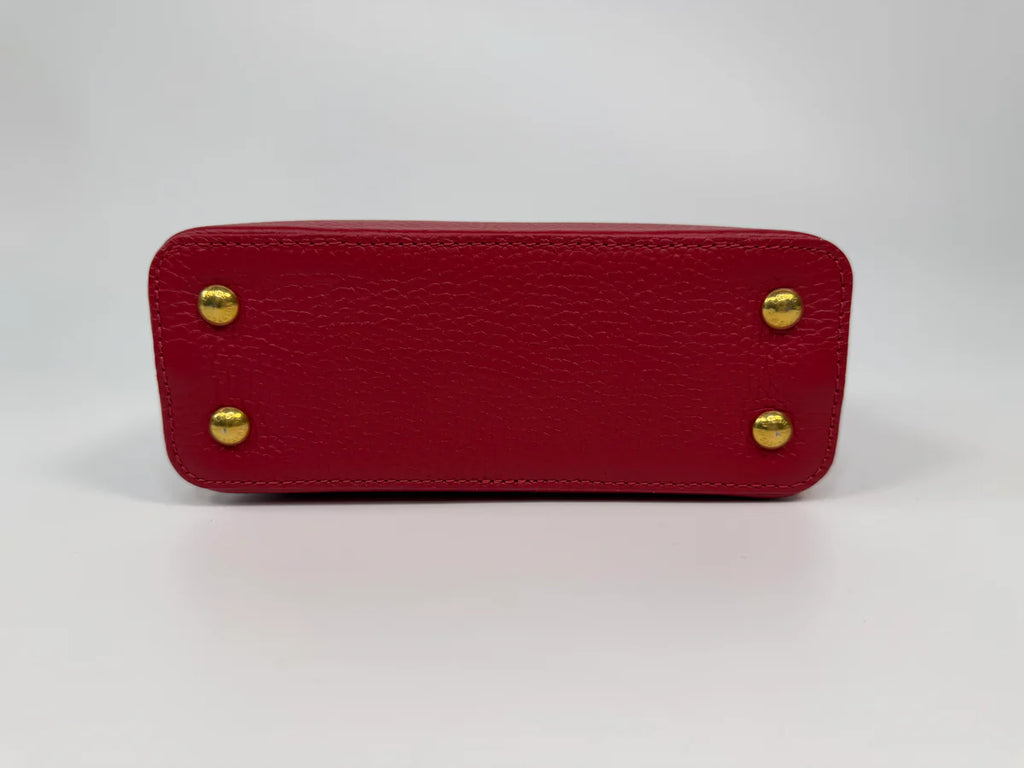 LOUIS VUITTON CAPUCINES MINI BAG IN SCARLET TAURILLION LEATHER WITH GOLD HARDWARE