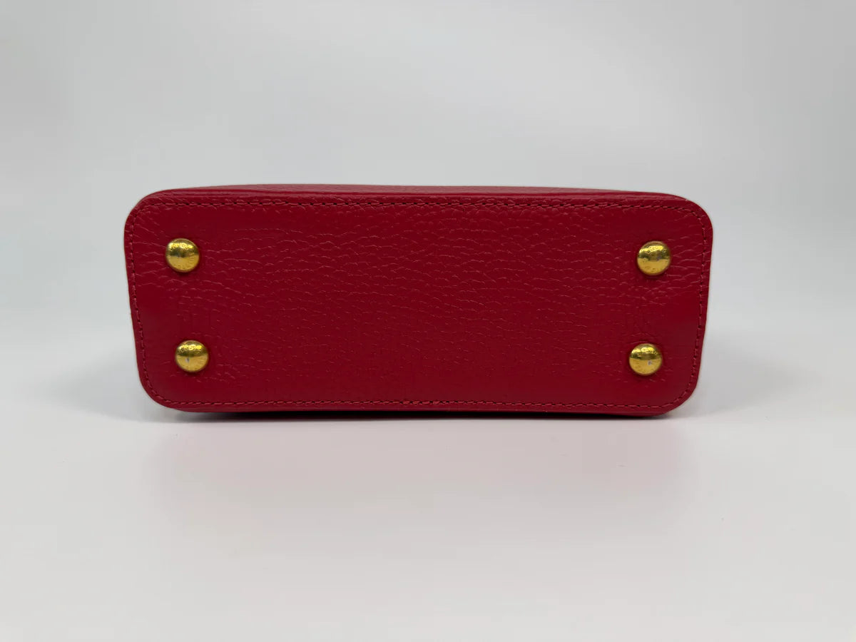 LOUIS VUITTON CAPUCINES MINI BAG IN SCARLET TAURILLION LEATHER WITH GOLD HARDWARE