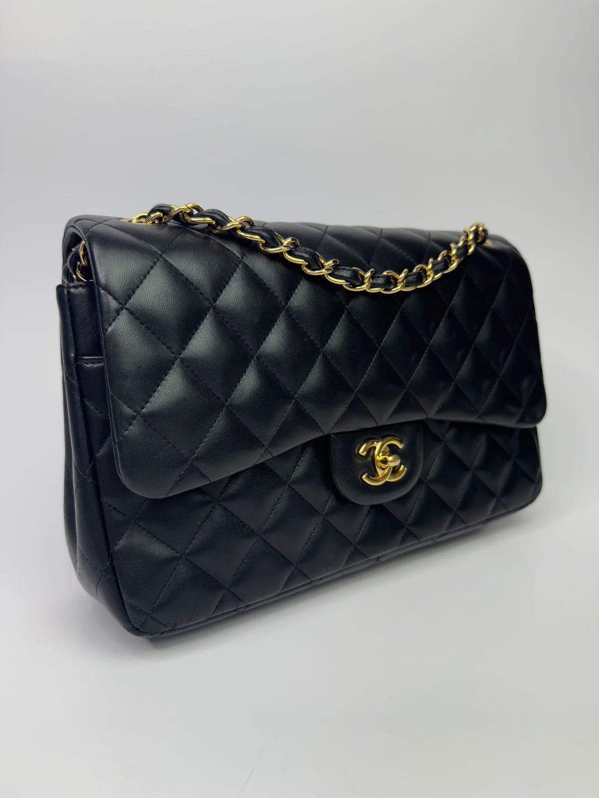 CHANEL BLACK LAMBSKIN LEATHER JUMBO CLASSIC DOUBLE FLAP GOLD HARDWARE