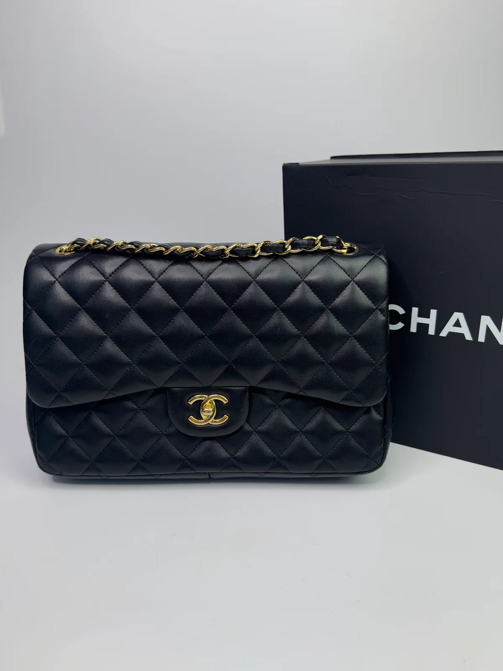 CHANEL BLACK LAMBSKIN LEATHER JUMBO CLASSIC DOUBLE FLAP GOLD HARDWARE