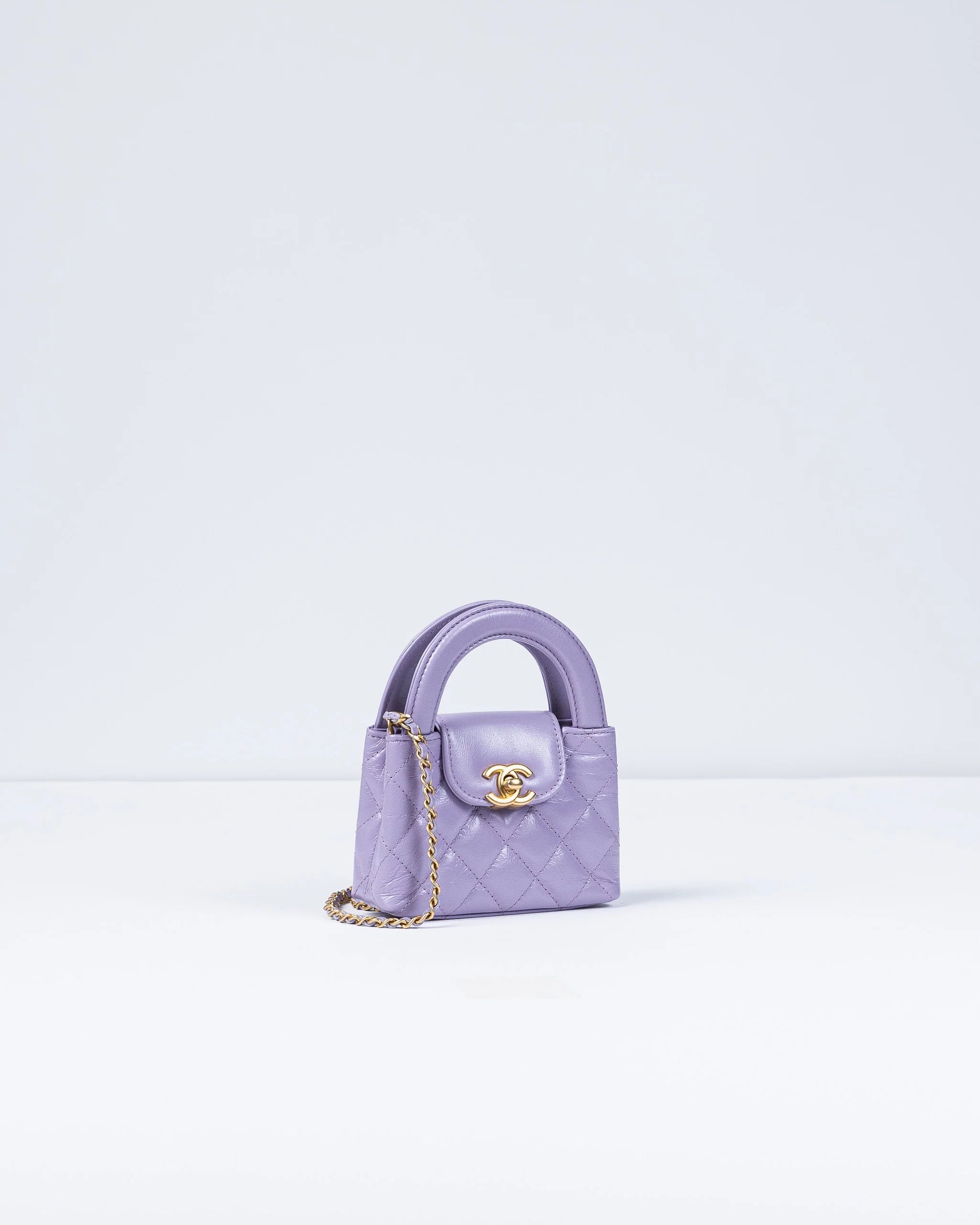 Chanel Kelly Bag Shiny Aged Calfskin & Gold-Tone Metal in Lavender Micro size