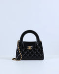 Chanel Kelly Bag Shiny Aged Calfskin & Gold-Tone Metal in Black Medium size