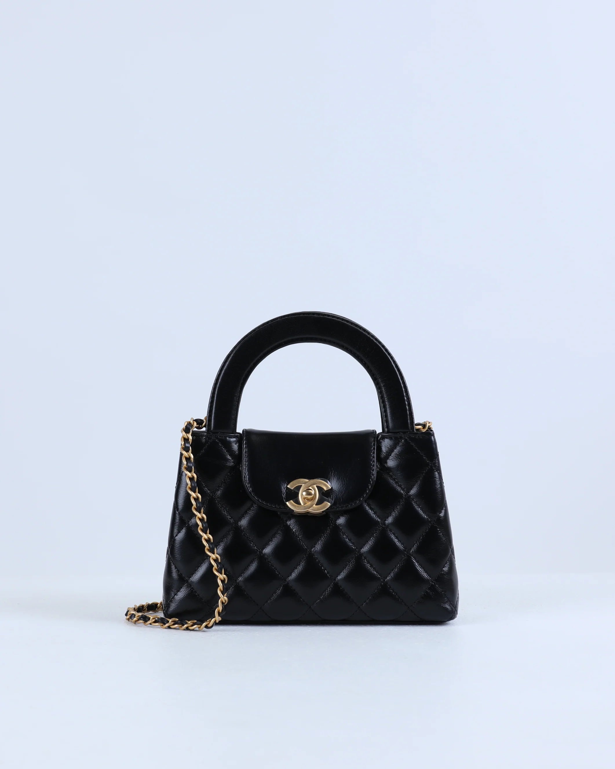 Chanel Kelly Bag Shiny Aged Calfskin & Gold-Tone Metal in Black Medium size