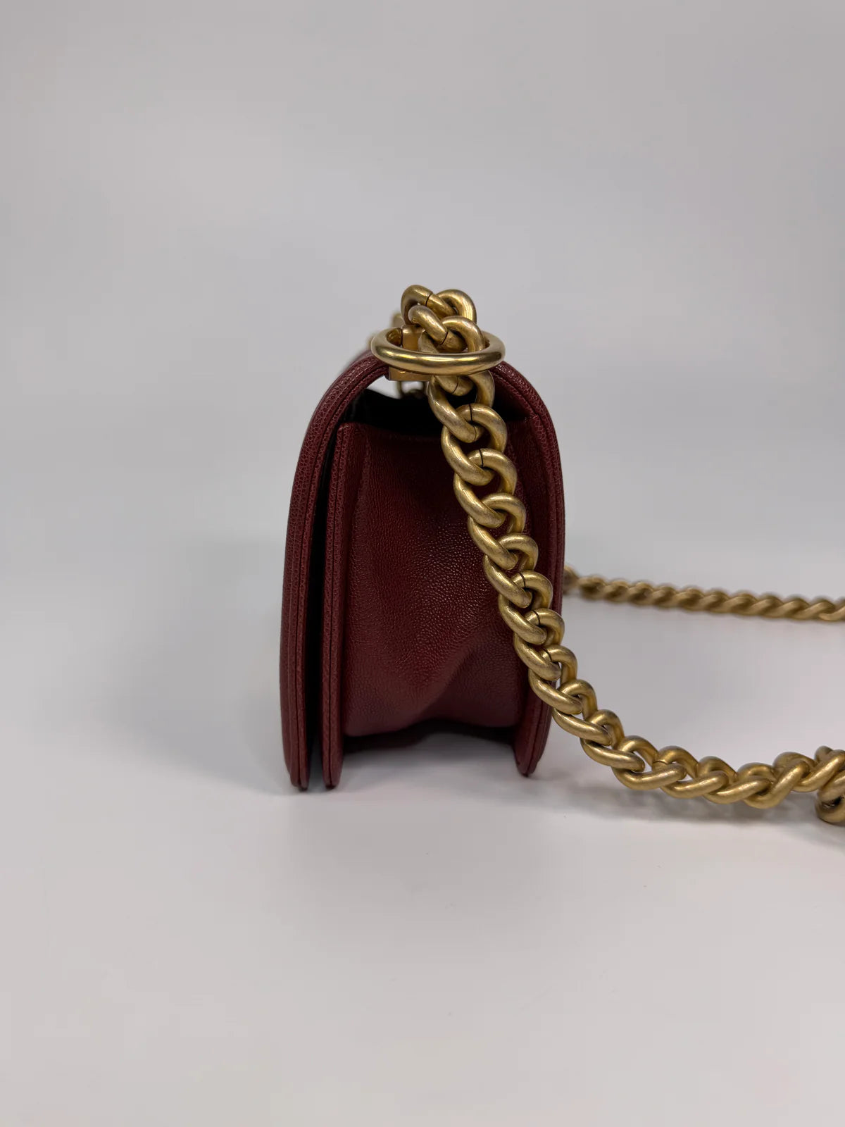 CHANEL SMALL LE BOY BAG IN BURGUNDY CAVIAR LEATHER WITH AGED GOLD HARDWARE