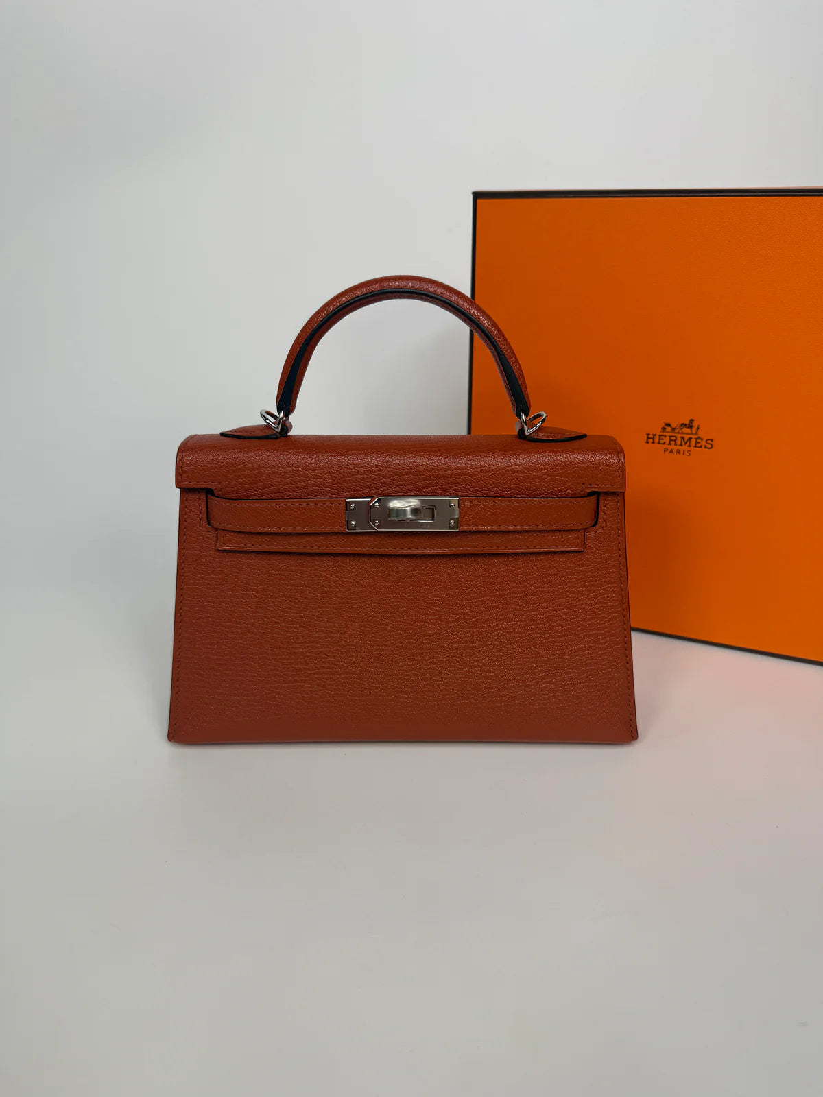HERMÈS MINI KELLY IN CUIVRE CHÈVRE MYSORE LEATHER WITH PALLADIUM HARDWARE