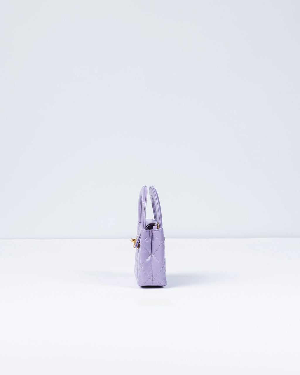 Chanel Kelly Bag Shiny Aged Calfskin & Gold-Tone Metal in Lavender Micro size