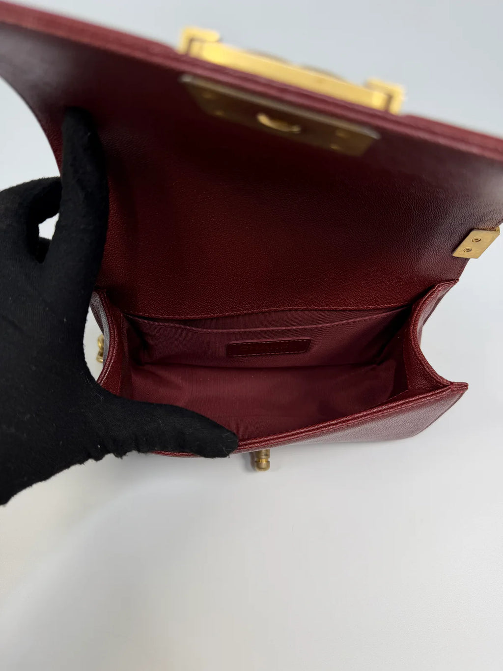 CHANEL SMALL LE BOY BAG IN BURGUNDY CAVIAR LEATHER WITH AGED GOLD HARDWARE