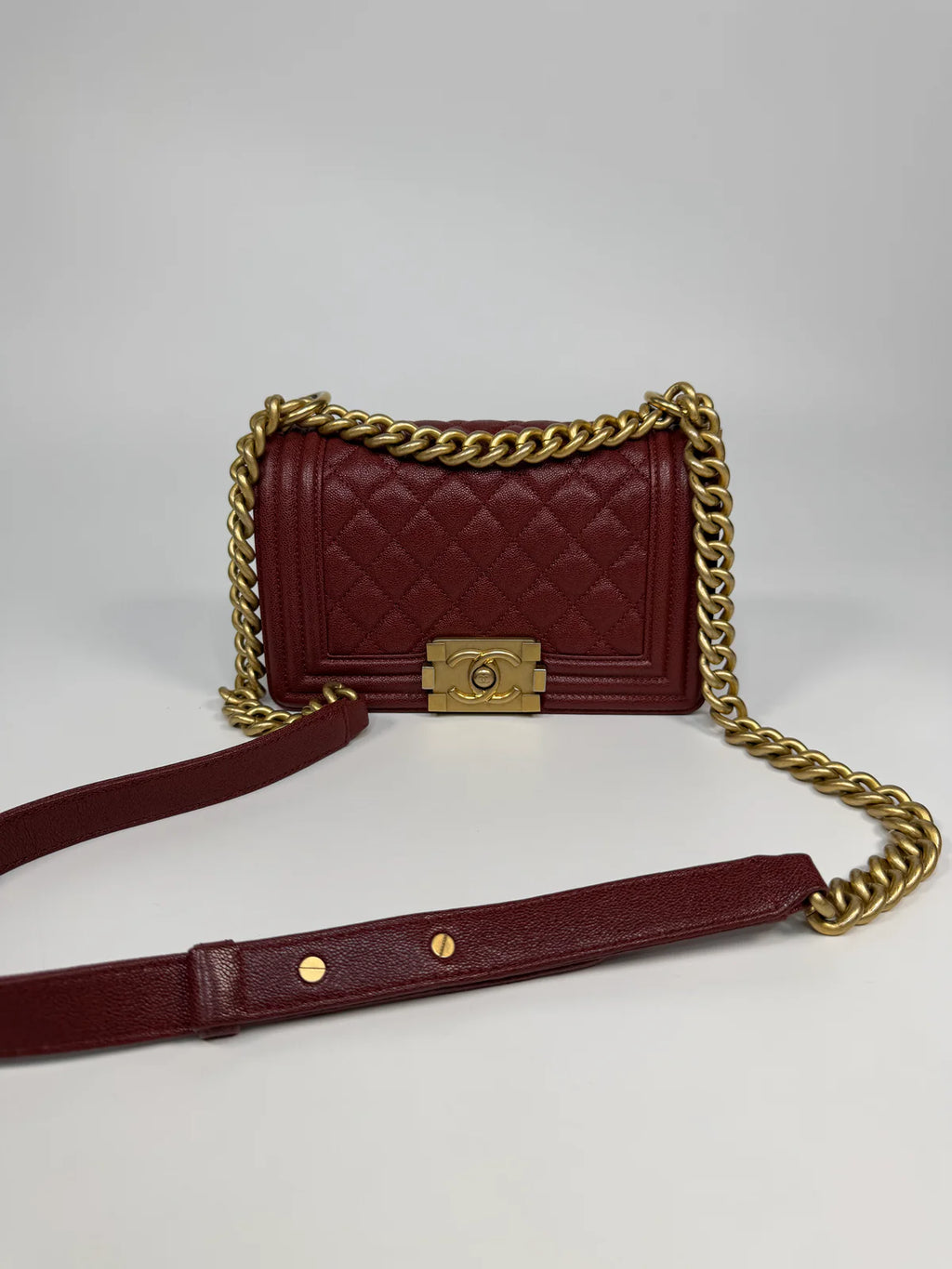 CHANEL SMALL LE BOY BAG IN BURGUNDY CAVIAR LEATHER WITH AGED GOLD HARDWARE