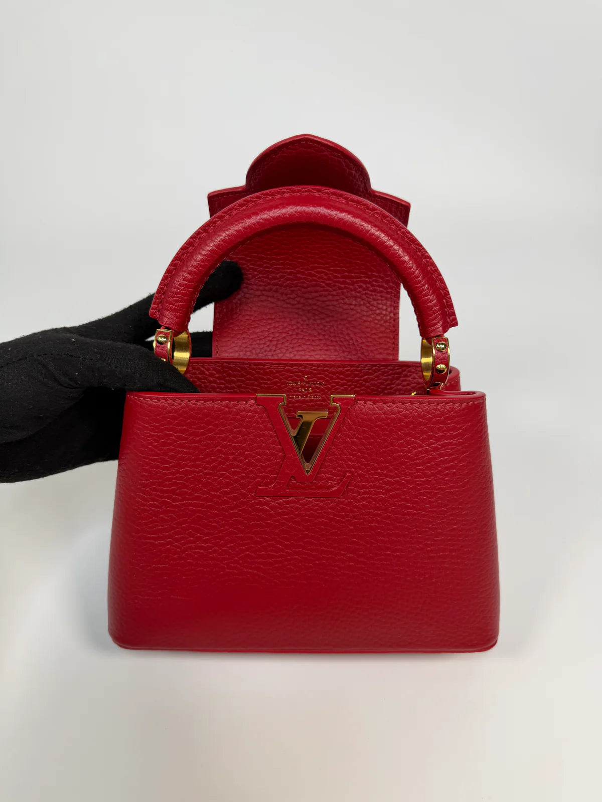 LOUIS VUITTON CAPUCINES MINI BAG IN SCARLET TAURILLION LEATHER WITH GOLD HARDWARE
