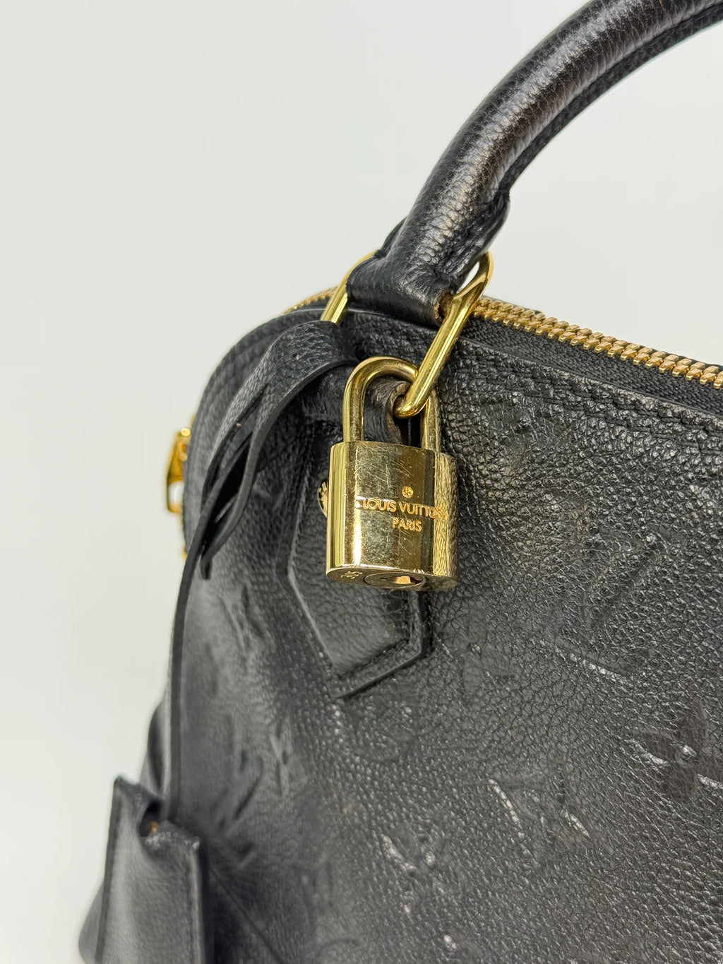 LOUIS VUITTON ALMA BB IN EMPREINTE BLACK MONOGRAM WITH GOLD HARDWARE