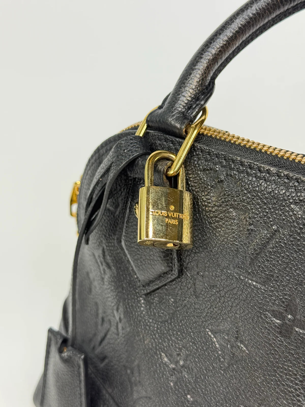 LOUIS VUITTON ALMA BB IN EMPREINTE BLACK MONOGRAM WITH GOLD HARDWARE