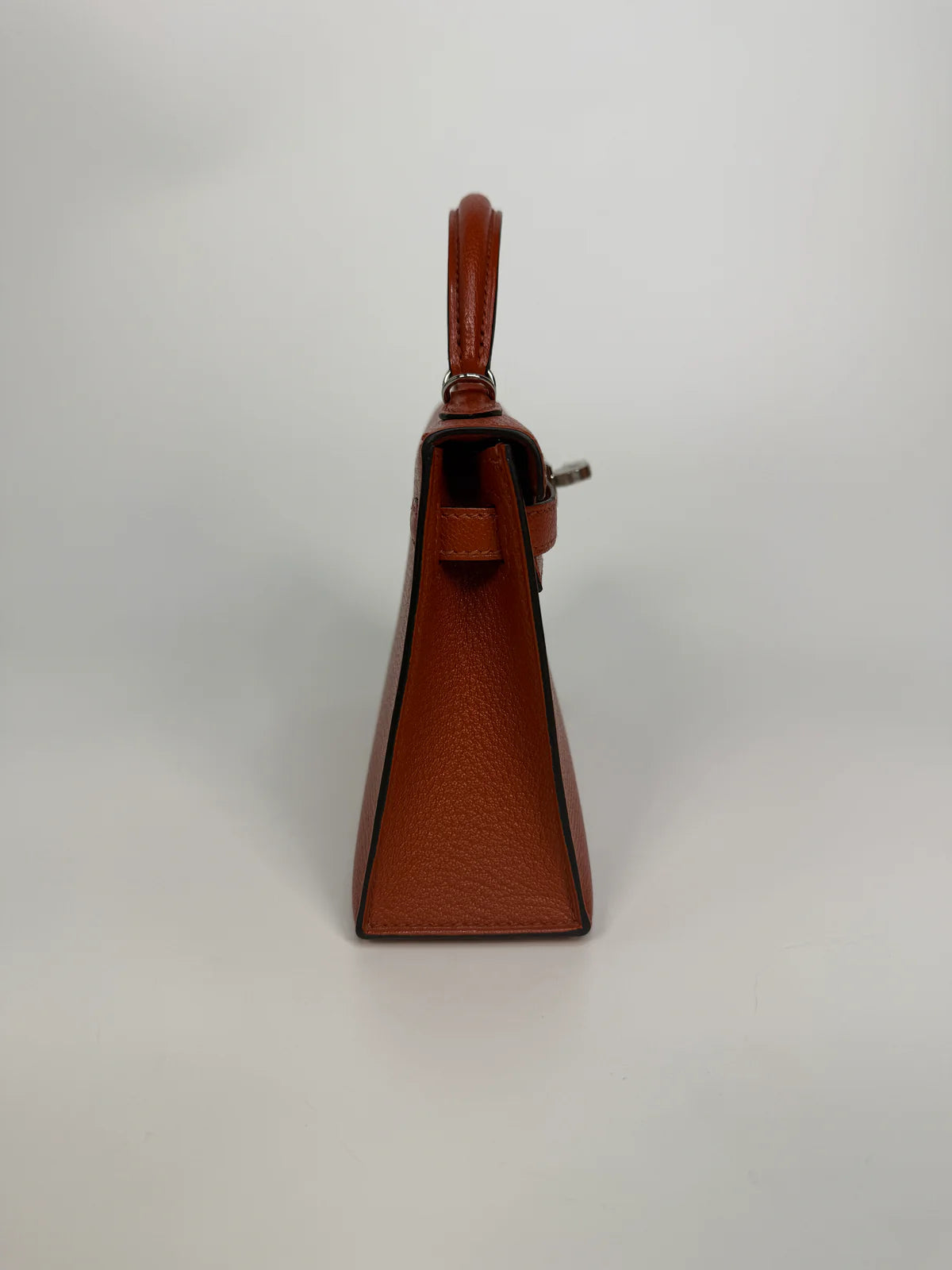 HERMÈS MINI KELLY IN CUIVRE CHÈVRE MYSORE LEATHER WITH PALLADIUM HARDWARE