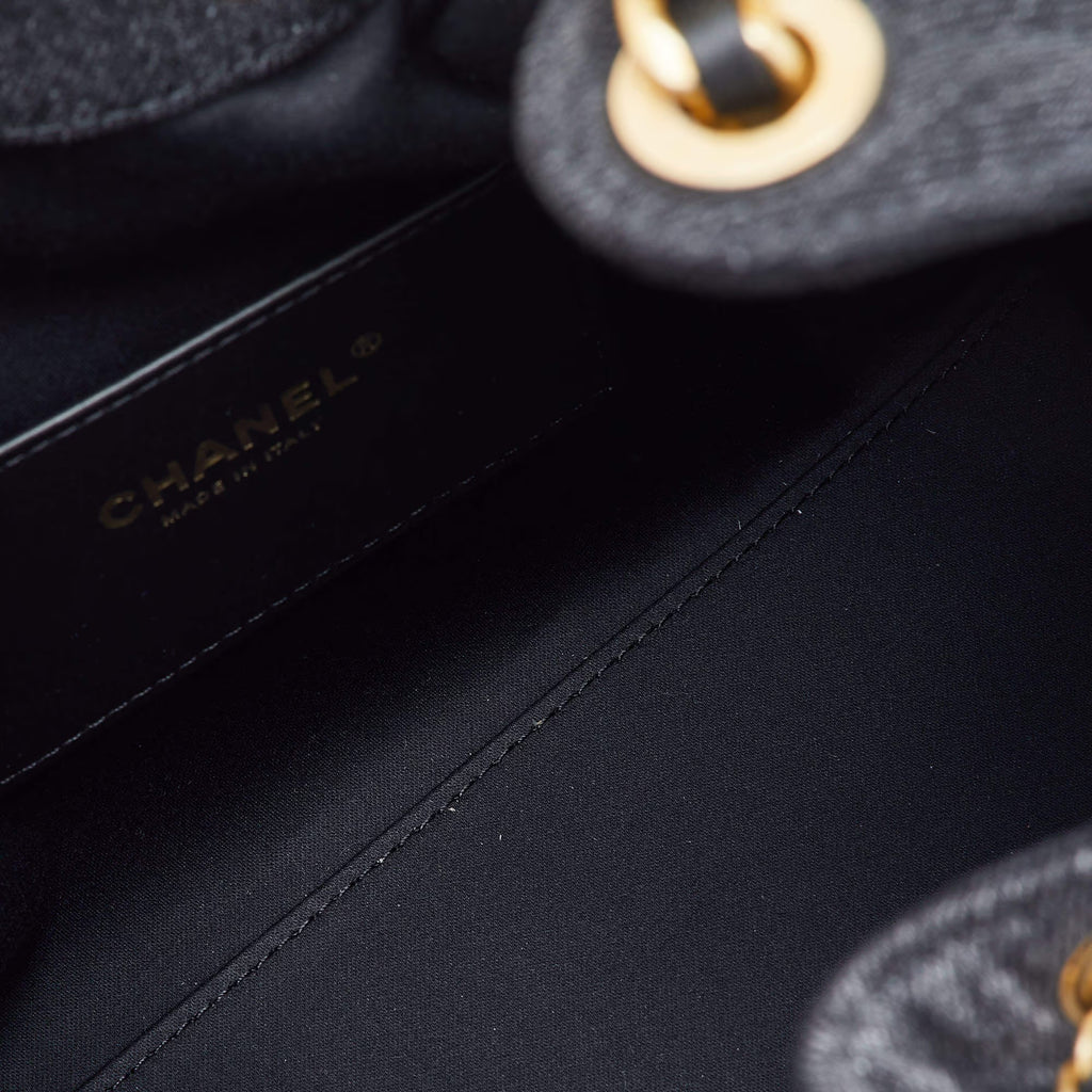 Chanel 25 Drawstring Black Quilted Denim Hobo