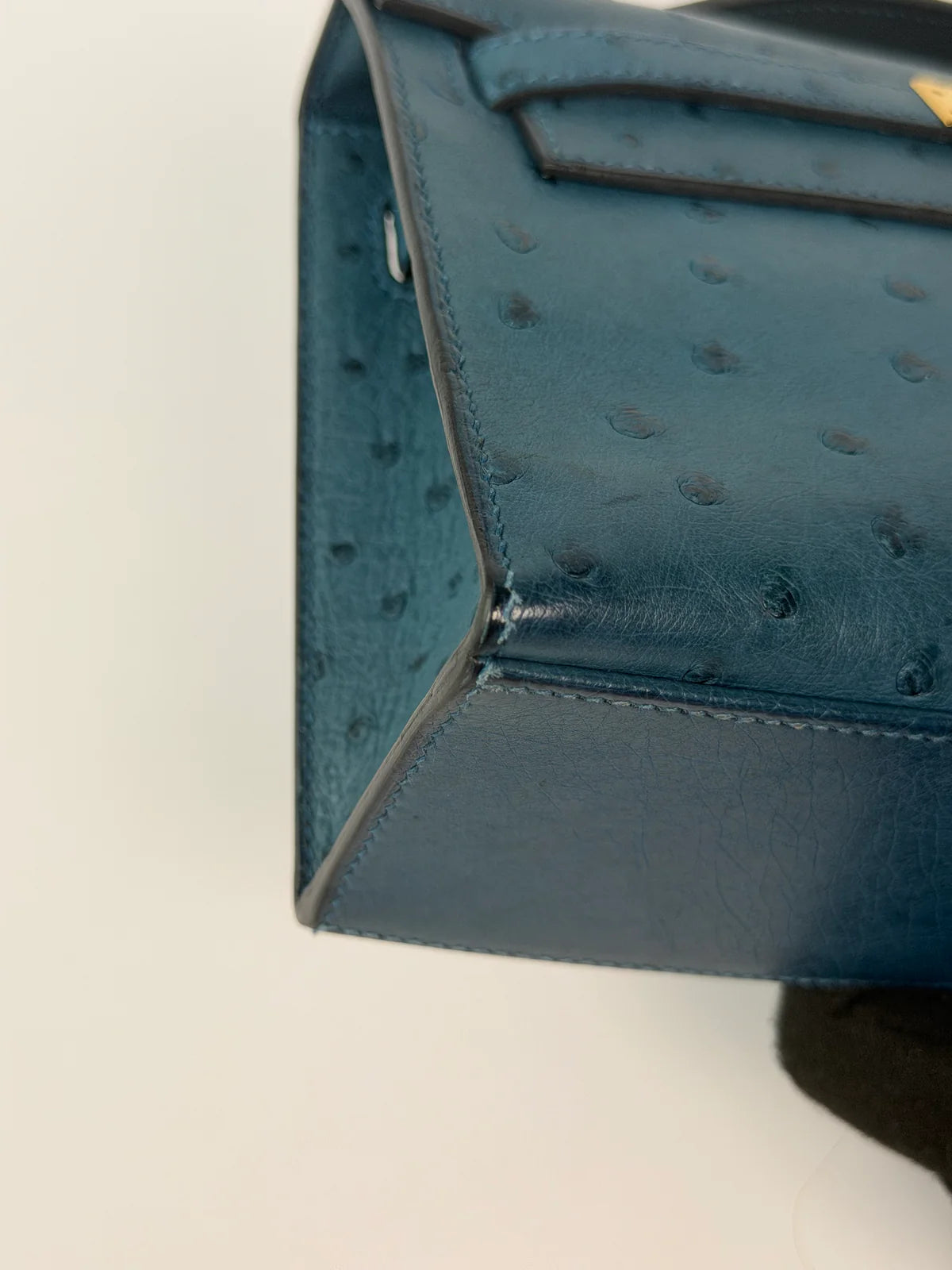 HERMÉS KELLY POCHETTE IN COLVERT OSTRICH WITH GOLD HARDWARE